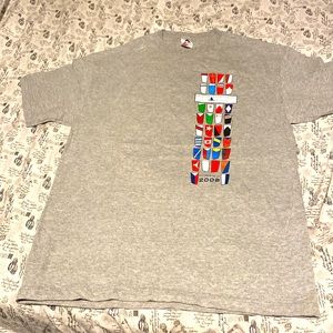 Nice T-shirts with all the flags are on the wall